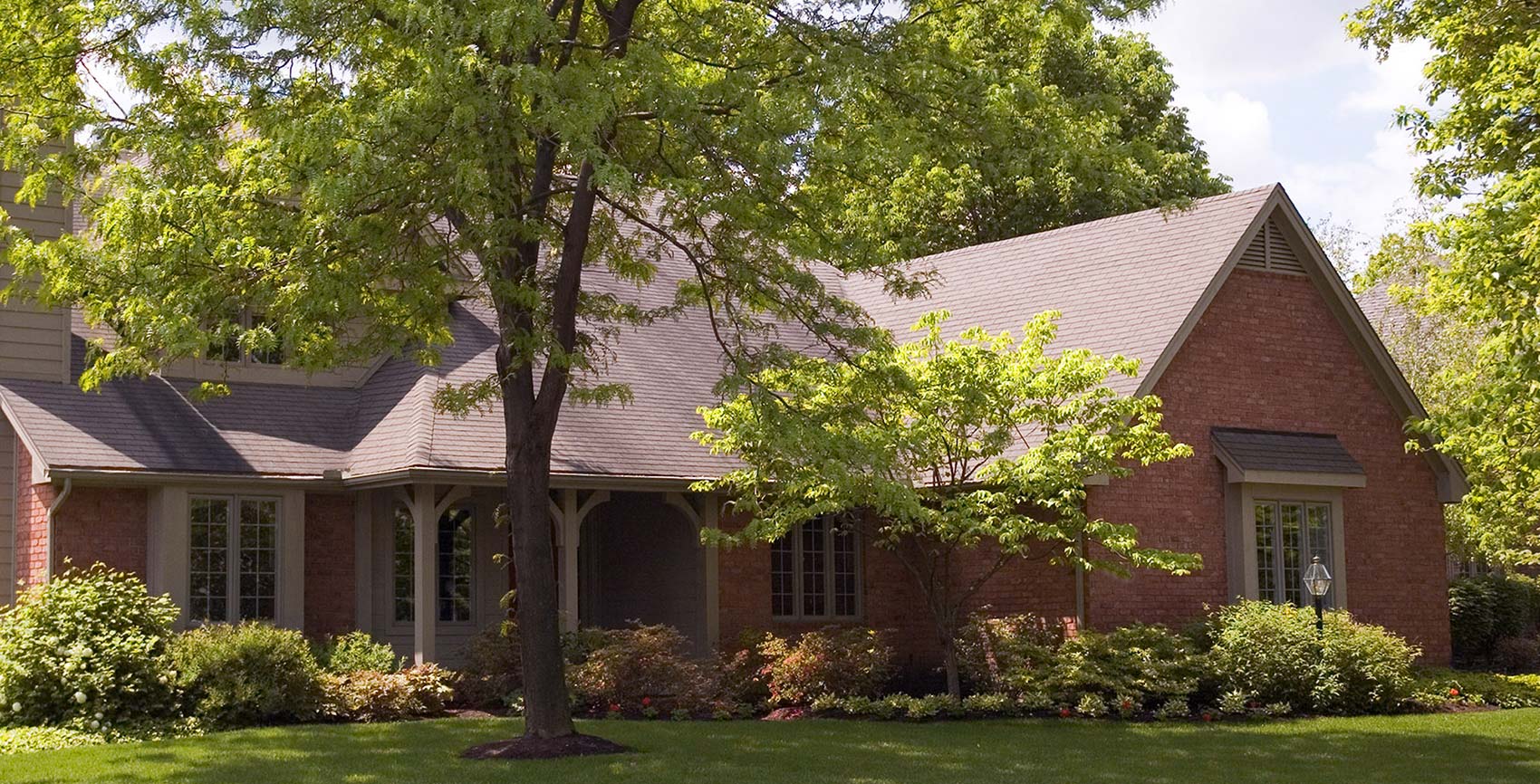 An American brick house typically seen while preforming home inspection services