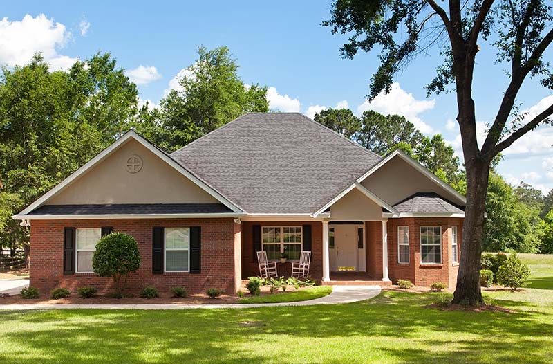 A newly constructed brick house seen while preforming home inspection services